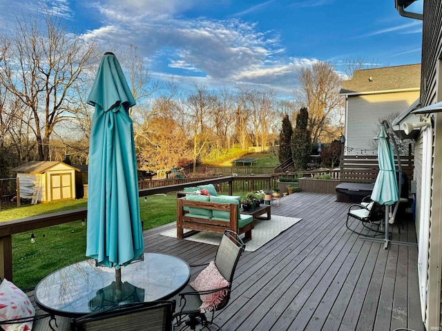 wooden terrace with a yard and a storage shed