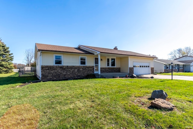 single story home featuring a garage and a front lawn