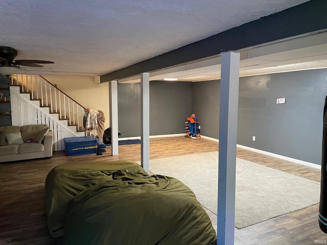 bedroom with hardwood / wood-style flooring and ceiling fan