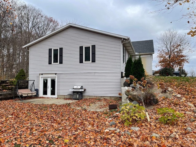 back of house with a patio and french doors