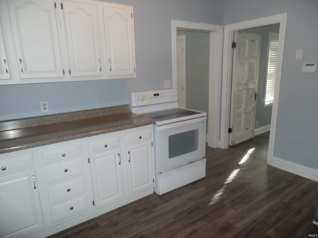 kitchen featuring white cabinetry, dark hardwood / wood-style floors, and white electric stove