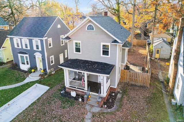 view of front of property featuring a porch and a front yard