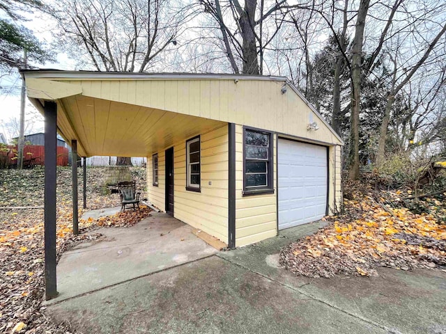 exterior space with a carport