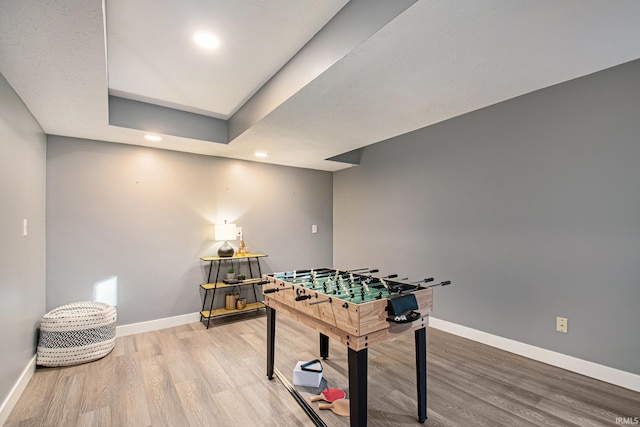 game room featuring hardwood / wood-style floors