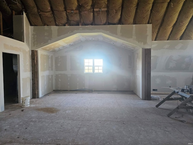 interior space featuring vaulted ceiling