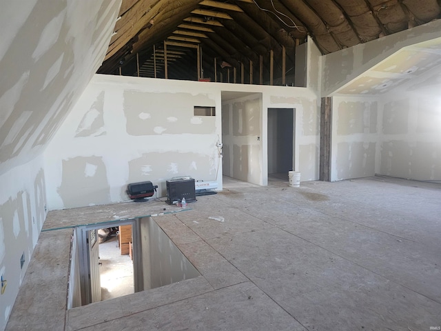 interior space featuring lofted ceiling