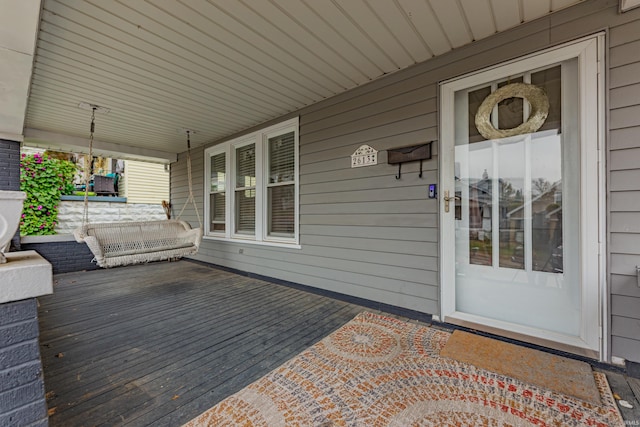 deck featuring covered porch