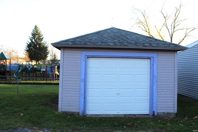 garage with a lawn