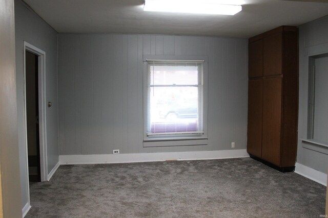 unfurnished bedroom with carpet