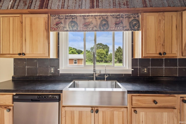 kitchen with dishwasher, tasteful backsplash, and sink