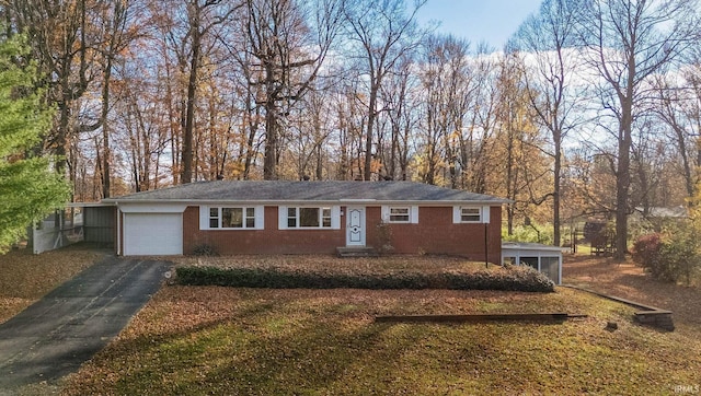 single story home with a garage