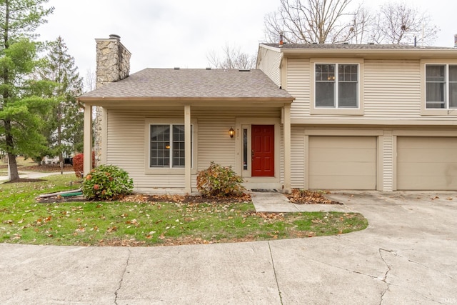 view of front of home with a garage