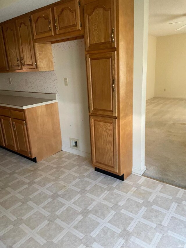 kitchen featuring ceiling fan