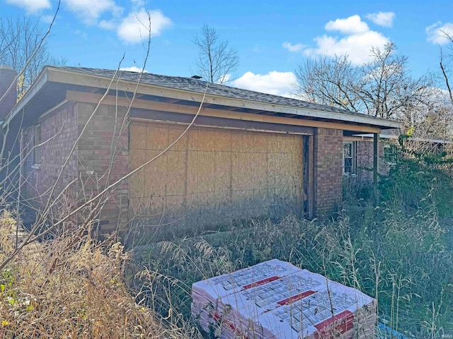 view of home's exterior featuring a garage