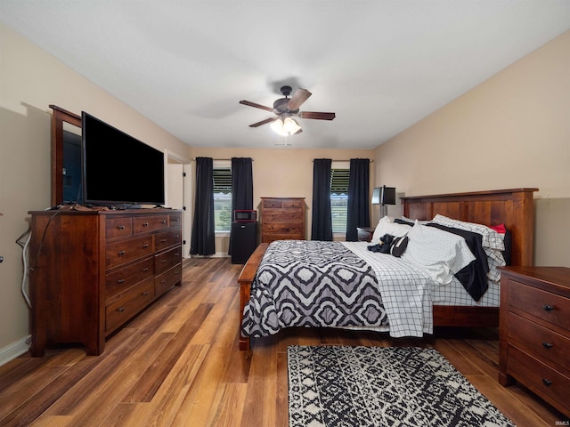 bedroom featuring wood-type flooring and ceiling fan