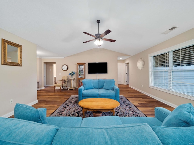 living room with dark wood-type flooring, ceiling fan, and lofted ceiling