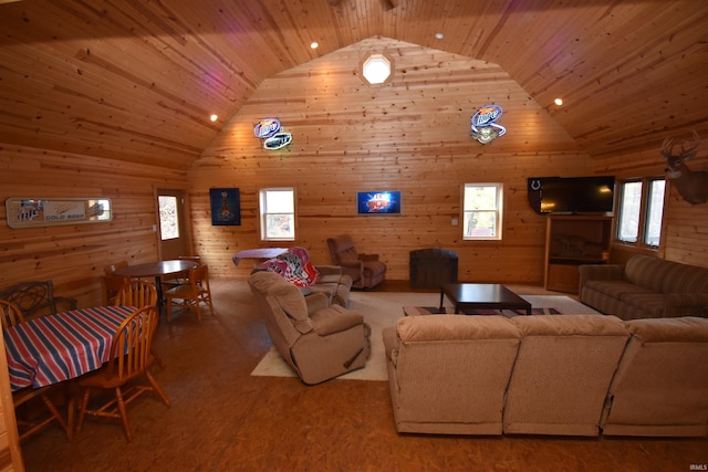 living room with wooden walls and wooden ceiling