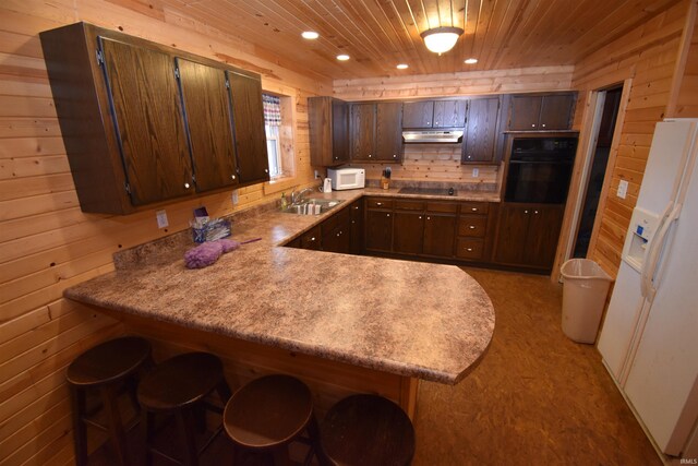 0 N 15e Rd, Jasper, IN 47546 - kitchen with black appliances, a sink, wooden ceiling, a peninsula, and recessed lighting