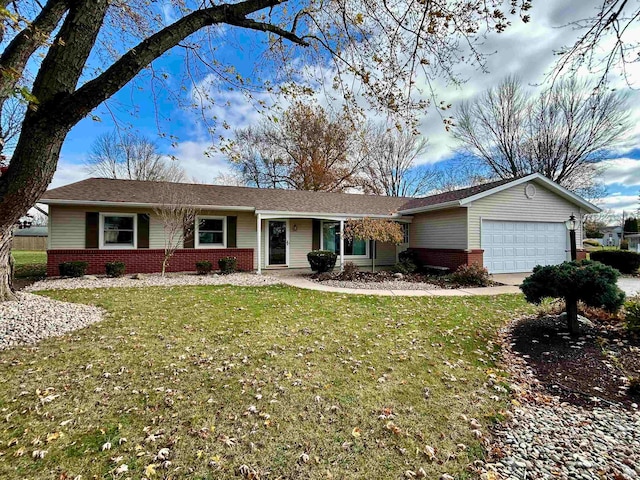 single story home with a garage and a front lawn