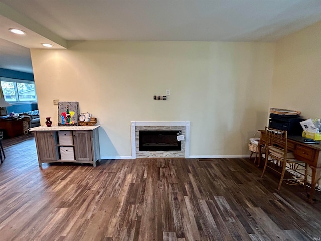 living room featuring dark wood-type flooring