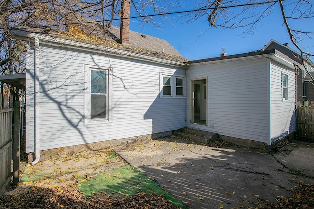 back of property with a patio area