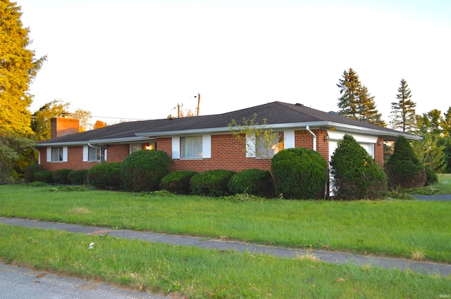 exterior space with a yard