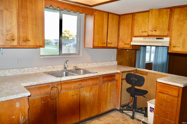 kitchen with light tile patterned flooring and sink