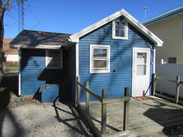 rear view of property with a deck