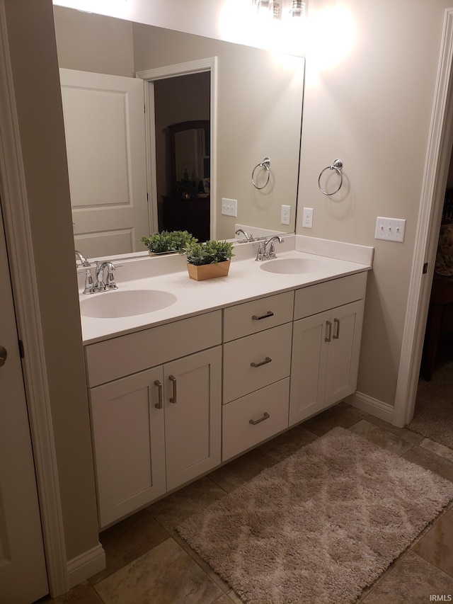 bathroom featuring vanity and tile patterned floors