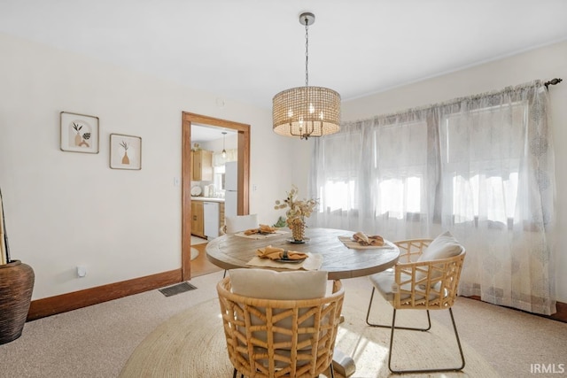 view of carpeted dining room