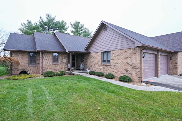 ranch-style house with a front yard and a garage