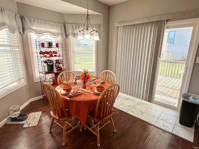 dining room featuring hardwood / wood-style floors and a wealth of natural light