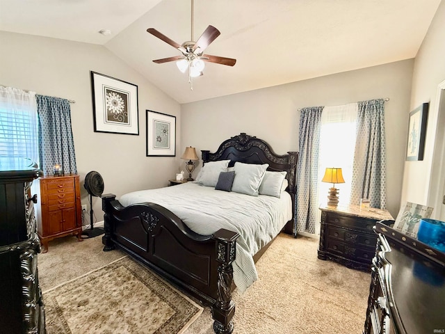 bedroom with light carpet, ceiling fan, and vaulted ceiling