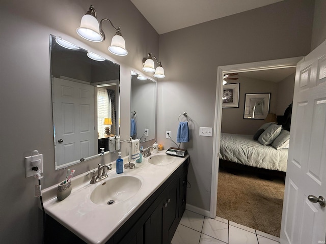 bathroom featuring vanity, lofted ceiling, and ceiling fan