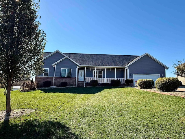 single story home with a front yard, a garage, and covered porch