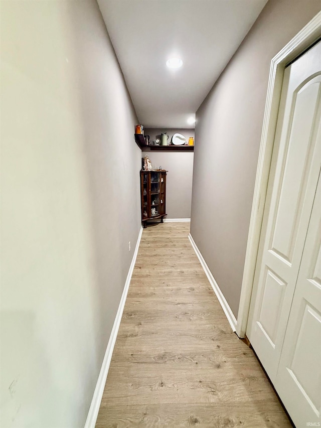 hallway featuring light hardwood / wood-style flooring