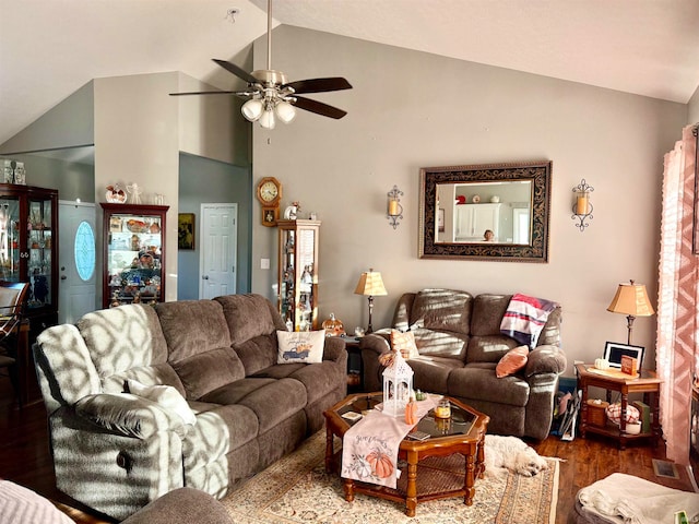 living room with vaulted ceiling, ceiling fan, and wood-type flooring