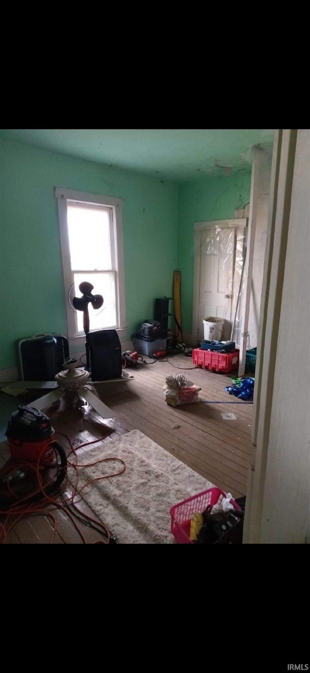 misc room with hardwood / wood-style floors