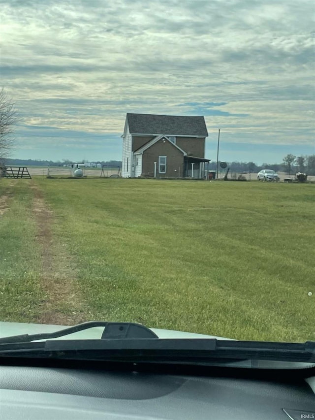 exterior space featuring a front lawn