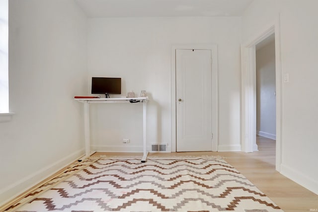 unfurnished room featuring light hardwood / wood-style flooring