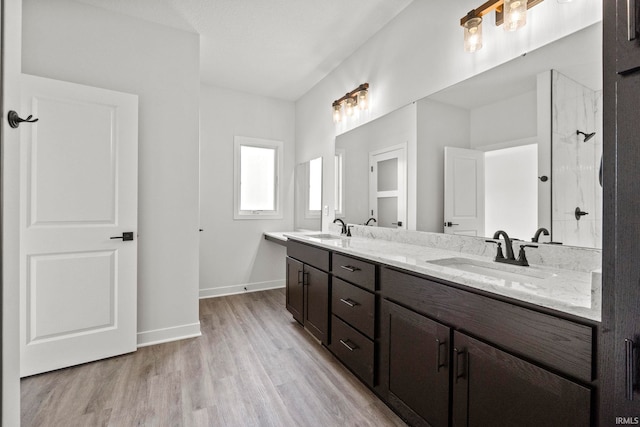 bathroom featuring vanity and hardwood / wood-style floors