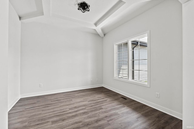 spare room with hardwood / wood-style flooring