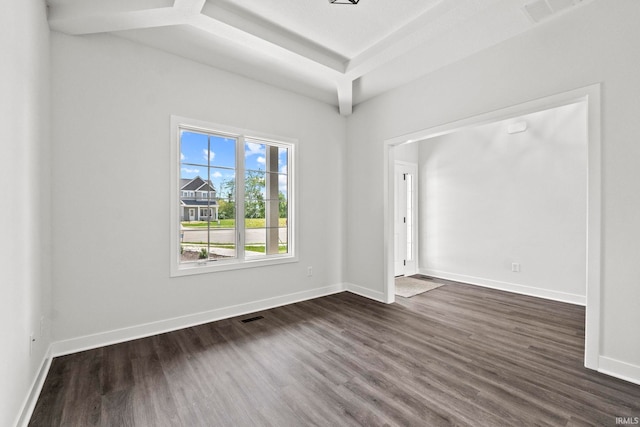 empty room with dark wood-type flooring