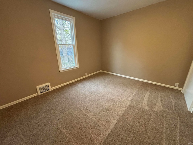 unfurnished room featuring carpet floors