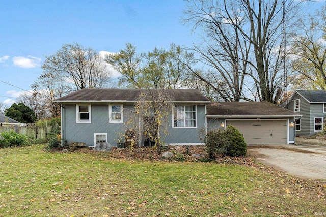 view of front of property with a front lawn and a garage