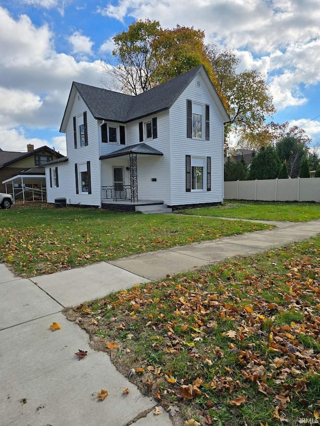 view of front of house featuring a porch and a front yard