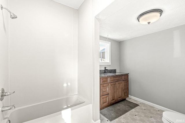 full bathroom featuring a textured ceiling, vanity, toilet, and shower / bathtub combination