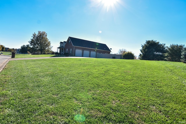 view of yard with a garage