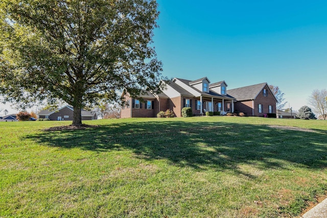 view of front of home with a front lawn