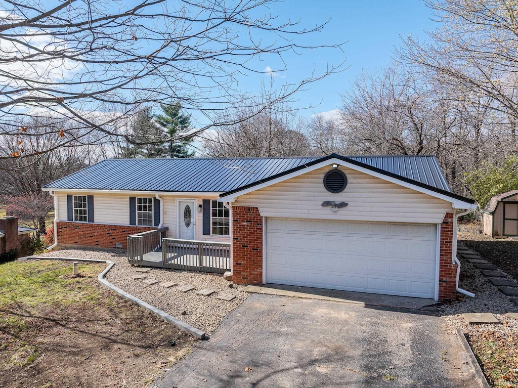 ranch-style home with a garage